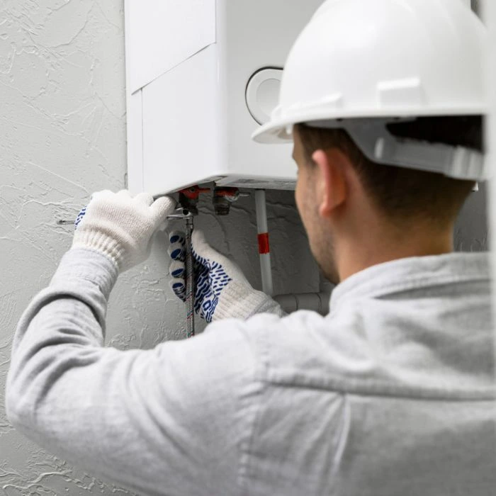Plumber fixing a sink